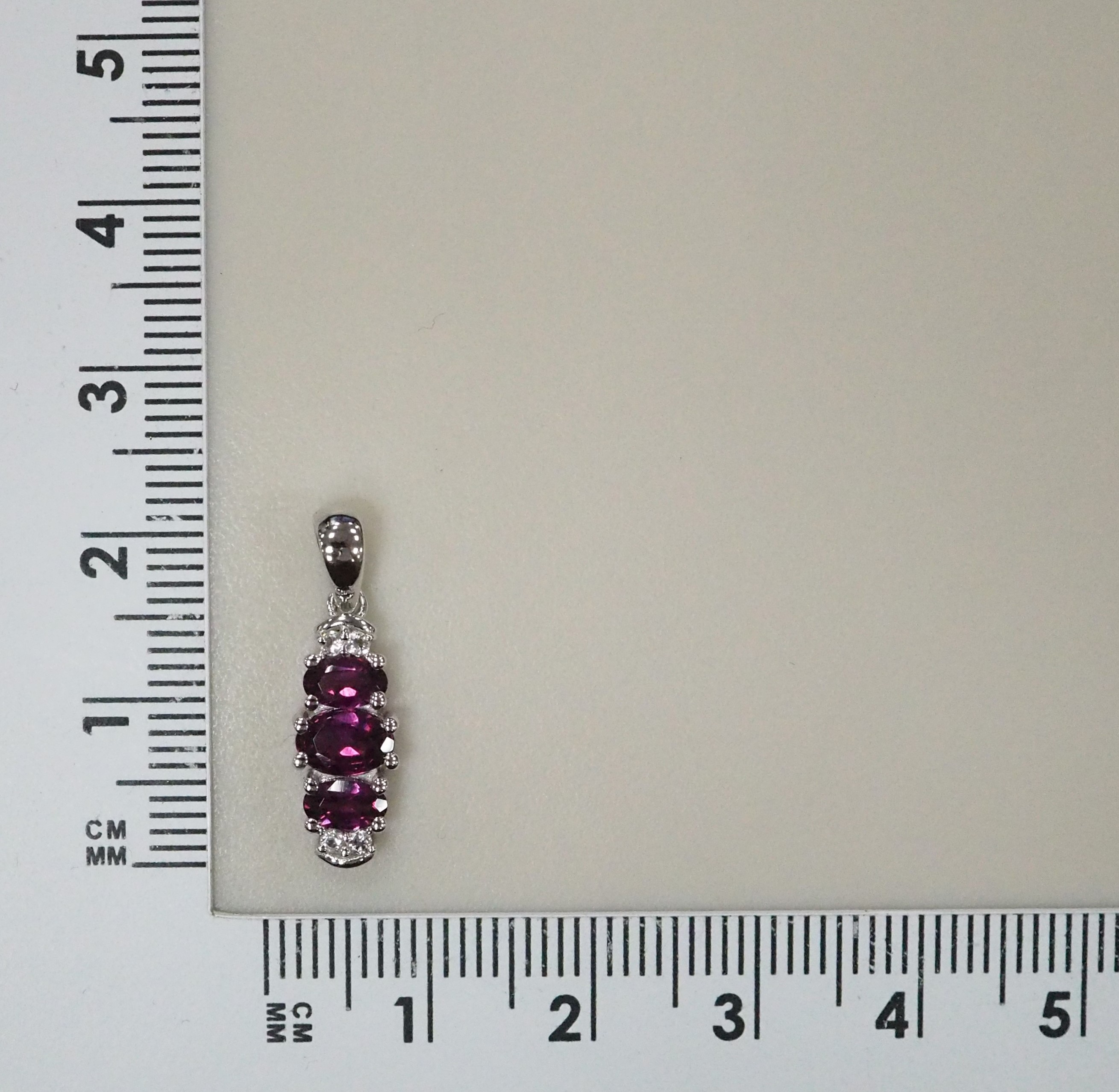 Серебряная подвеска с гранатами Умбалит